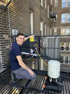 technician next to equipment