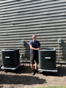 technician next to equipment